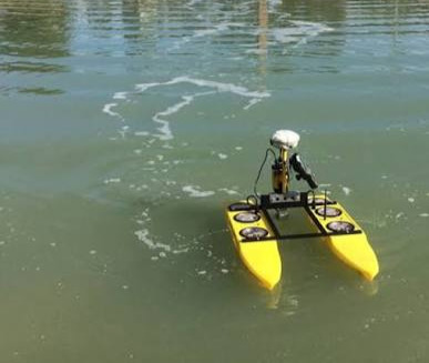 Boat near the shoreline for coastal survey work